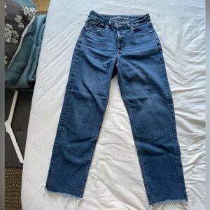 Blue American Eagle jeans with a raw hem 👖